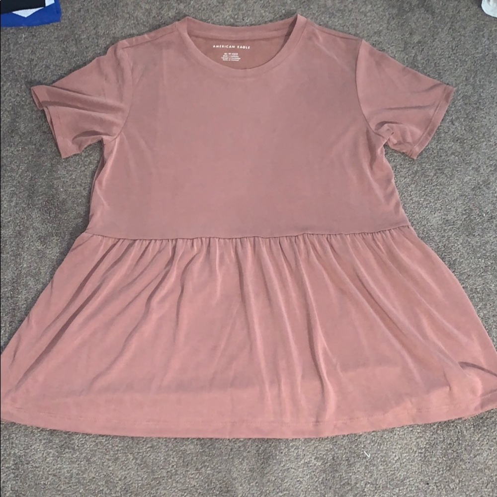 a pink babydoll tee